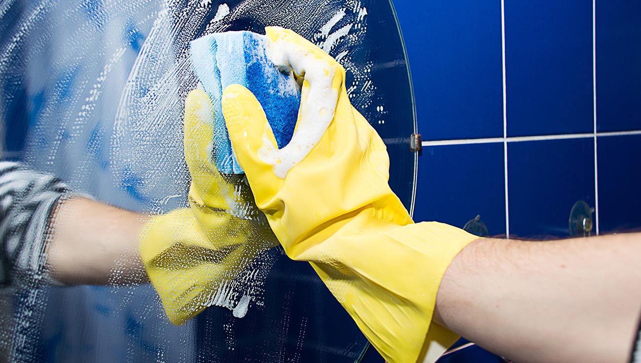 Person Washing a Mirror Person Washing a Mirror
